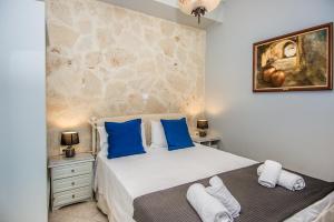 Posteľ alebo postele v izbe v ubytovaní Xenia Ionis luxury apartments