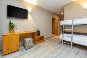 Postel nebo postele na pokoji v ubytování Hotel Vittoria - Ricarica l'anima