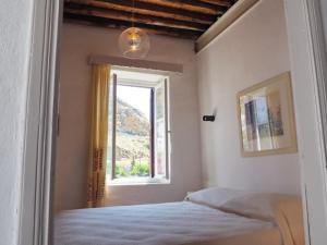 Postel nebo postele na pokoji v ubytování Cycladic House in Skiros