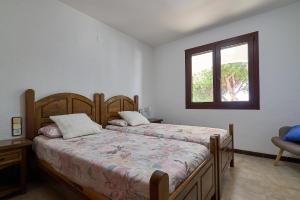 Ένα ή περισσότερα κρεβάτια σε δωμάτιο στο Mallorca duplex 1