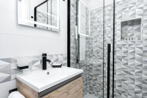 a bathroom with a sink and a shower at Casapà in Atrani