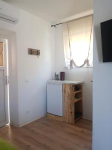 Virtuvė arba virtuvėlė apgyvendinimo įstaigoje Hamo Apartments & Soba