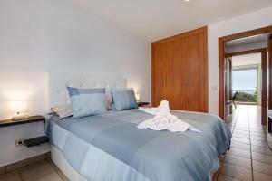 Posteľ alebo postele v izbe v ubytovaní Apartamento Relax and Dream