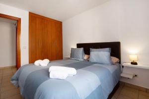 Posteľ alebo postele v izbe v ubytovaní Apartamento Relax and Dream