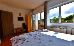 Posteľ alebo postele v izbe v ubytovaní Apartment Marija Zupan