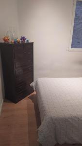 A bed or beds in a room at Apartamento 2 dormitorios cerca de Manuel Becerra