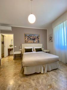 Postel nebo postele na pokoji v ubytování A Due Passi B&B