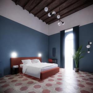 ein Schlafzimmer mit einem weißen Bett und blauen Wänden in der Unterkunft Passepartout in Rom