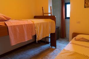 A bed or beds in a room at Villa Gialì