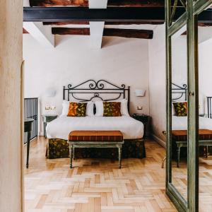 Un pat sau paturi într-o cameră la Costantinopoli 104