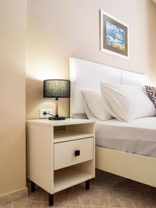 Postel nebo postele na pokoji v ubytování Dina Studio Argostoli 1