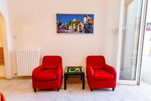 A seating area at Antonella home b&b