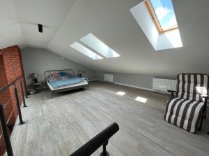 Posteľ alebo postele v izbe v ubytovaní Sun&Sport Apartament PANORAMA dwupoziomowy i przestronny