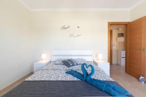 Łóżko lub łóżka w pokoju w obiekcie Pent house ocean view