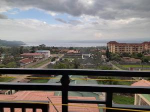a view of the ocean from a balcony at 1 BR FULLY FURNISHED NAKA in Nakuru