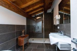 a bathroom with a sink and a shower at Portami in Collina in San Martino Buon Albergo