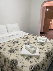 Letto o letti in una camera di Palazzo Porta
