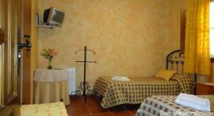 Łóżko lub łóżka w pokoju w obiekcie Casa Rural Aguascebas
