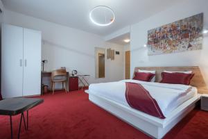 Postel nebo postele na pokoji v ubytování Austrian Palace Hotel + 28 fotografií