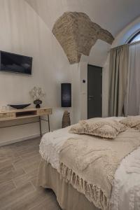 Posteľ alebo postele v izbe v ubytovaní Dimore D'Avalos Boutique bed & breakfast
