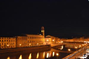 Nespecifikovaný výhled na destinaci Pisa nebo výhled na město při pohledu z penzionu