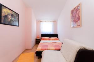 Postel nebo postele na pokoji v ubytování Apartments Damir