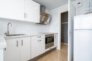 Dapur atau dapur kecil di Hauzify I Apartament Esmeralda