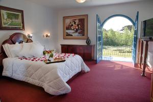 TV a/nebo společenská místnost v ubytování Hotel Gramado Palace