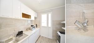 Una cocina o zona de cocina en Unico apartman