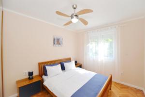 Cama o camas de una habitación en Unico apartman