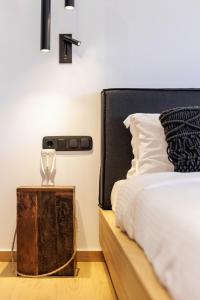 Postel nebo postele na pokoji v ubytování Kentro Luxury Suites
