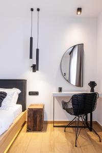 Postel nebo postele na pokoji v ubytování Kentro Luxury Suites
