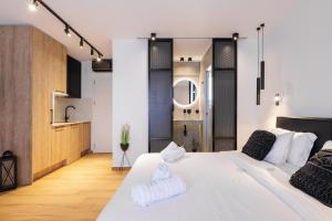 Postel nebo postele na pokoji v ubytování Kentro Luxury Suites
