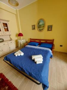 Posteľ alebo postele v izbe v ubytovaní Casa da Flo'