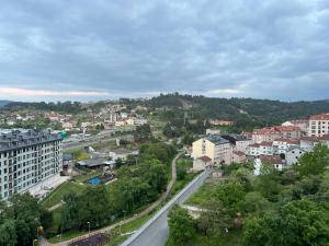 a view of a city with buildings and a street at Atico Plus A Valenzá in Ourense