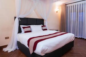 Postel nebo postele na pokoji v ubytování Olsupat Lodge