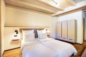 Postel nebo postele na pokoji v ubytování Kraidlhof Designapartment Veronika