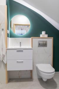 Kúpeľňa v ubytovaní MS-APART Apartament Wood&Sauna Ogrody Pieniawskie