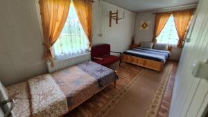 Ένα ή περισσότερα κρεβάτια σε δωμάτιο στο Вила Райски кът 1- Сърница