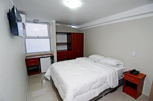 Postel nebo postele na pokoji v ubytování Hotel Plaza Sullana