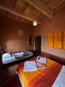 Cama o camas de una habitación en La Fibule D'or