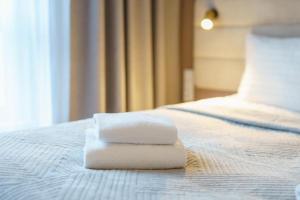 Posteľ alebo postele v izbe v ubytovaní Bel Mare Apartament E338 FREE PARKING