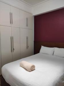 Postel nebo postele na pokoji v ubytování E-Just Hotel Borg El Arab
