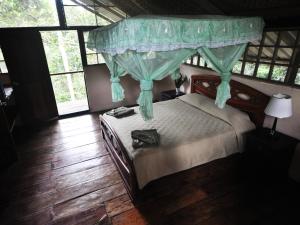 Cama o camas de una habitación en Tapir Lodge
