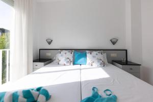 Posteľ alebo postele v izbe v ubytovaní Bravissimo Estel A6 S'Agaró