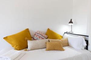 A bed or beds in a room at Bravissimo Estel A6 S'Agaró