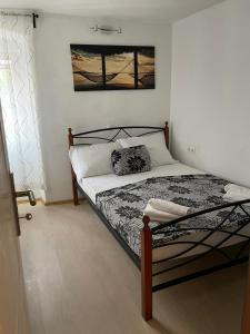 Säng eller sängar i ett rum på Zadar Beach