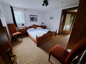 Postel nebo postele na pokoji v ubytování Blue Mountain Hotel
