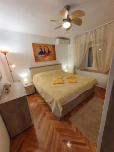 Postel nebo postele na pokoji v ubytování Apartman Stela
