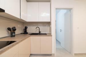 Kuchyň nebo kuchyňský kout v ubytování Apartman Stela